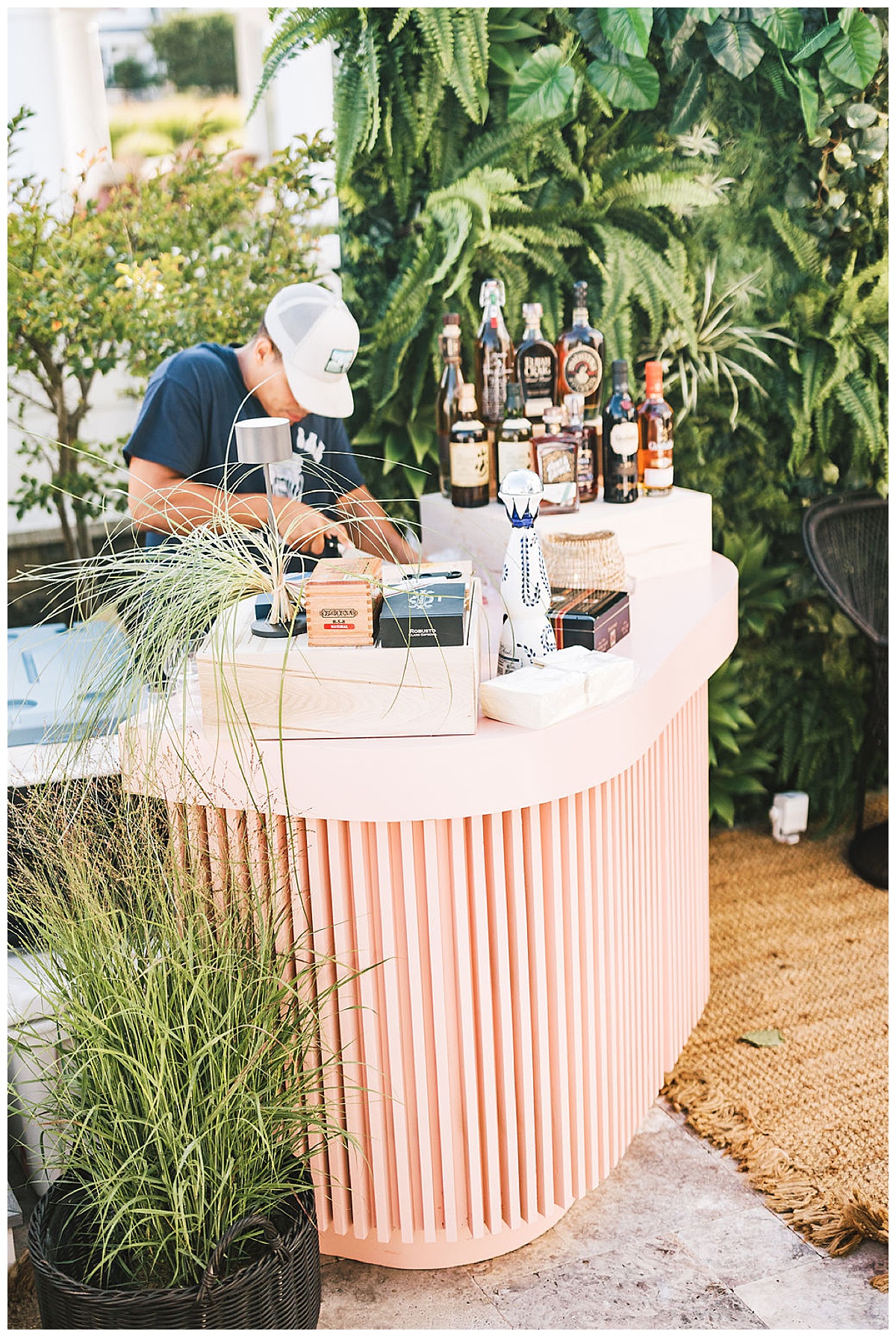 A petite pink bar serving tequila and cigars.