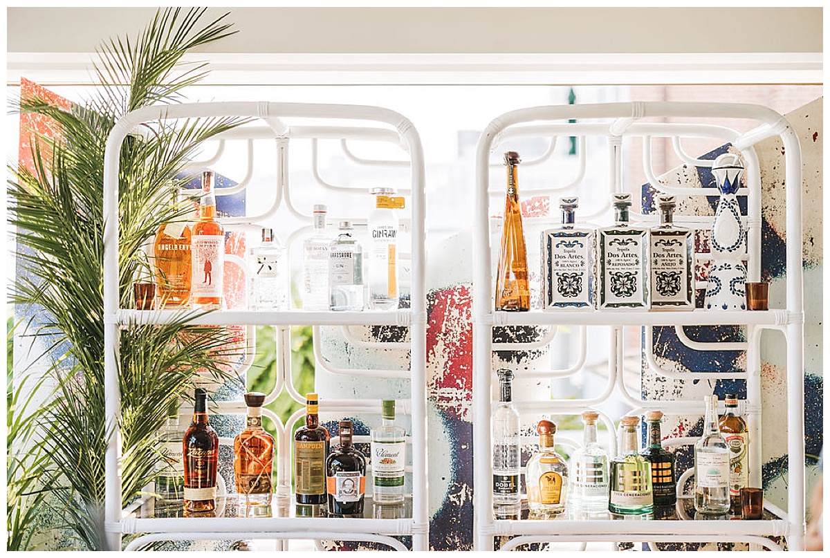 Retro bamboo shelves displaying liquor.