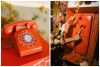 Close-up of an orange vintage rotary phone on display, adding a nostalgic and playful element to the Verona Sunset event decor.