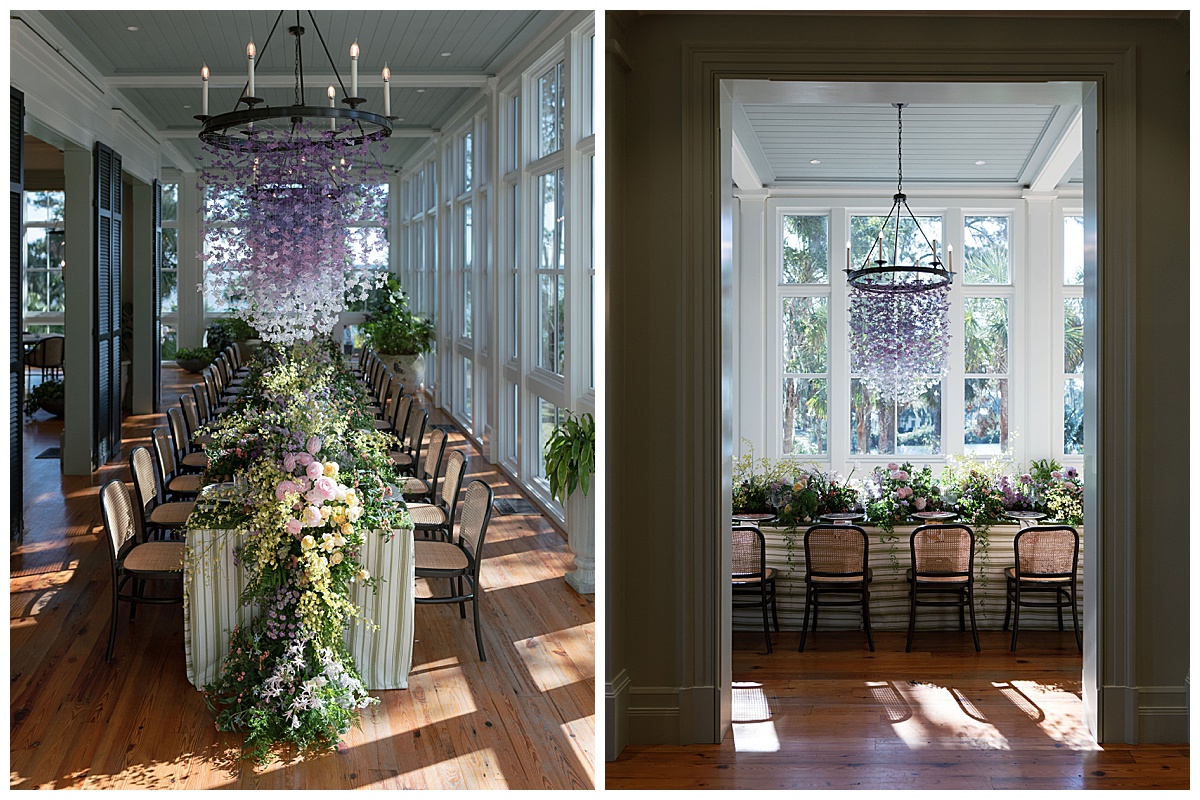 Long indoor dining table with striped linens and cascading florals under a purple ombré butterfly chandelier. Rentals by Something Vintage Rentals, the U.S. East Coast’s best event rental and wedding decor company.